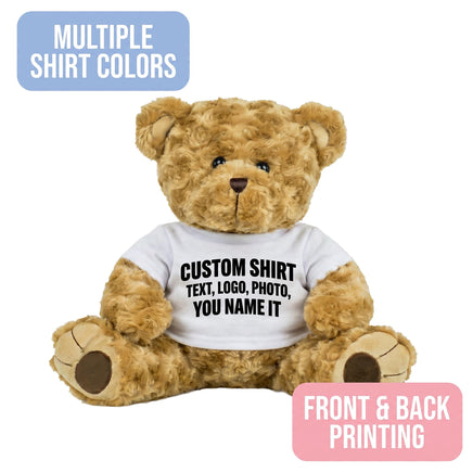 A brown teddy bear wearing a white t-shirt with the text "CUSTOM SHIRT" printed on it.