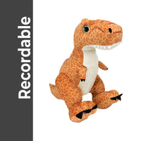 A stuffed toy dinosaur with a brown and orange spotted pattern, sitting on its hind legs with its front legs raised.