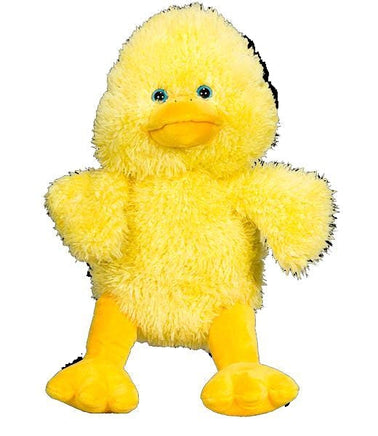 A large, plush yellow duck toy with blue eyes and a yellow beak.