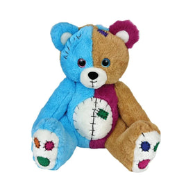 A colorful teddy bear with a blue and brown color scheme, featuring a patchwork design with various colors and patterns.