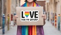 A person is holding a sign that says "LOVE has no gender".