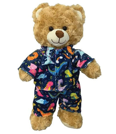 A brown teddy bear wearing a colorful dinosaur pajama set.