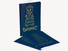 two blue passports with gold text and illustrations, including a bear holding a suitcase.