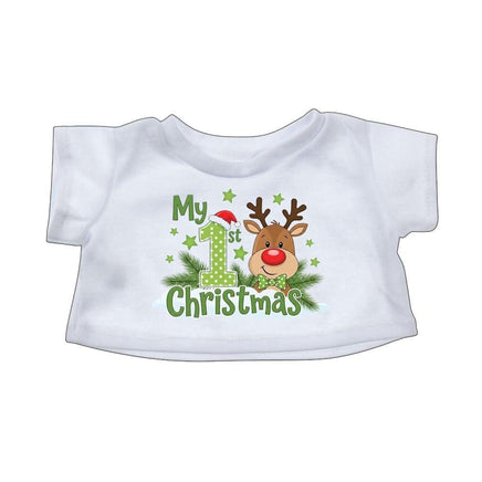 A white t-shirt with a Christmas-themed design featuring a reindeer wearing a Santa hat and the text "My 1st Christmas" along with a number 1 and star motif.