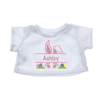 A white t-shirt with a personalized name and Easter-themed graphics printed on it.