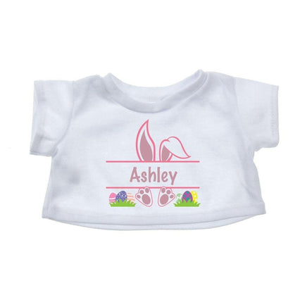A white t-shirt with a personalized name and Easter-themed graphics printed on it.