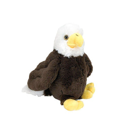 A stuffed toy eagle with a brown body and white head, yellow beak, and feet, sitting on a white background.