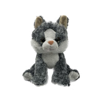 A gray and white stuffed cat toy is sitting on a white background.