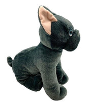A plush toy of a black dog with a pink ear.