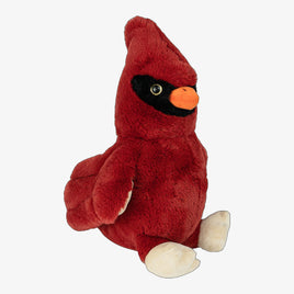 A red plush toy of a cardinal bird, with a black beak and feet, is sitting on a white background.