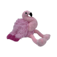 A pink plush flamingo toy is sitting on its hind legs against a white background.