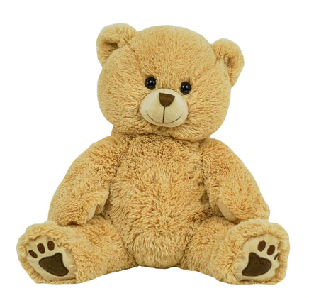 A large, light brown teddy bear sitting on its hind legs with its front paws resting on the ground.