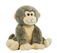 A stuffed monkey toy sitting on its hind legs against a white background.