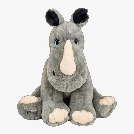 A plush toy rhinoceros with a gray body, white horn, and blue eyes.