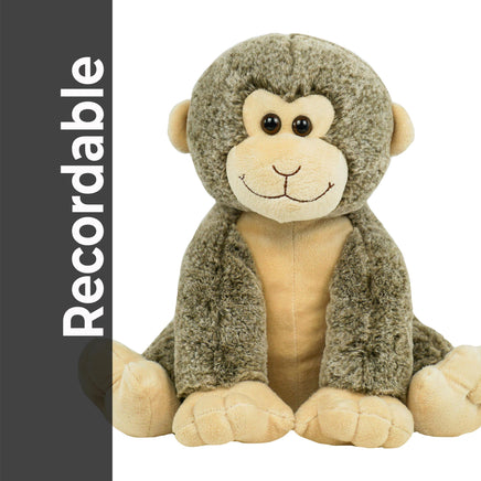 A plush toy monkey sitting on a white background.