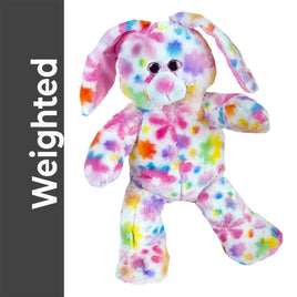 A colorful, multicolored stuffed rabbit toy is shown in the image.