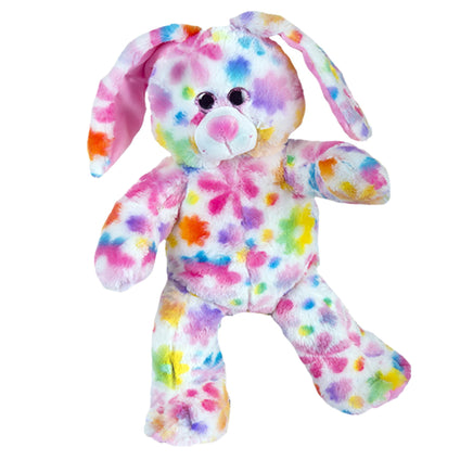 A colorful, multicolored stuffed bunny toy with a pattern of flowers and spots.