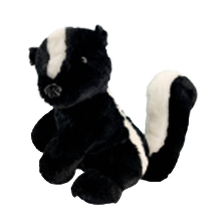 A black and white stuffed skunk toy is sitting on a white background.