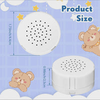 The image is a product size diagram for a white speaker with a circular design and a speaker with a circular design. The speaker has a diameter of 1.73 inches and a height of 0.96 inches. The image also includes a cartoon image of a bear and a bear with a yellow star on its head.