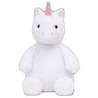 A white plush unicorn toy with a pink horn and tail.