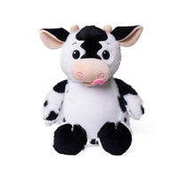 A stuffed cow toy with black and white spots and a pink tongue sticking out.