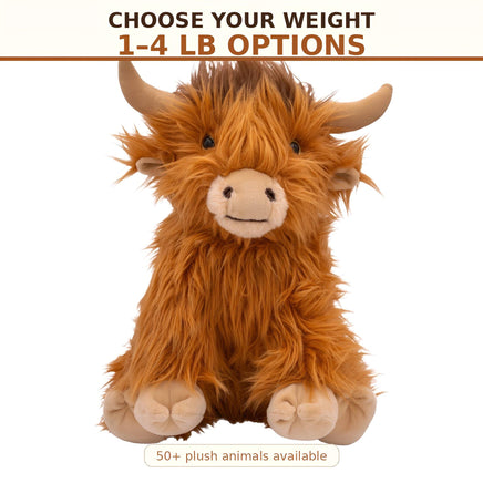 a large stuffed animal resembling a furry, horned creature with a smiling expression.