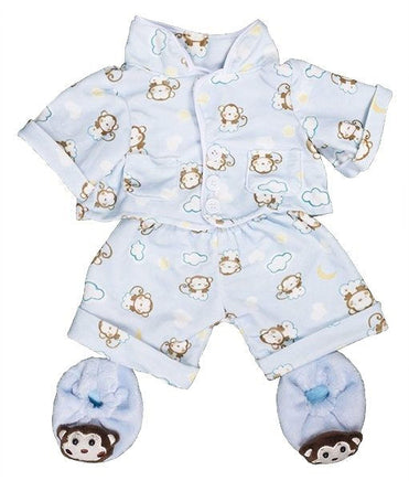 A pajama set featuring a light blue top with a monkey pattern and matching shorts, along with blue monkey slippers.