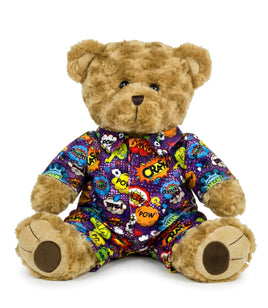 A brown teddy bear wearing a colorful, patterned outfit with various pop art-style designs.