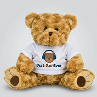 A brown teddy bear wearing a white t-shirt with the text "Best Dad Ever" printed on it.
