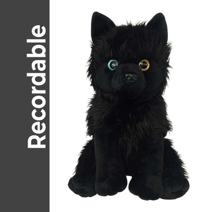 A black plush toy dog with large, expressive eyes and a fluffy, furry appearance.