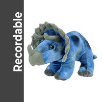 A blue plush toy of a triceratops, with a gray horn and blue eyes, is shown against a white background.