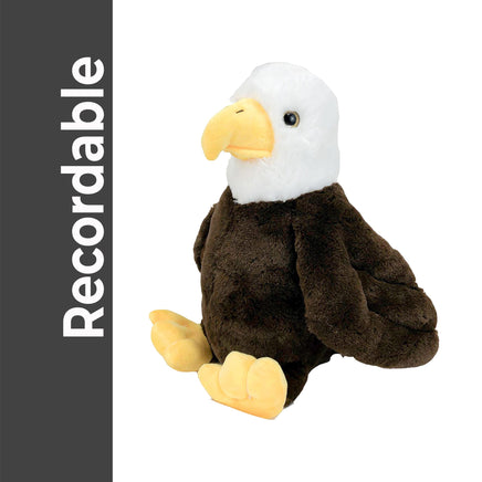A stuffed eagle toy is sitting on a white background.