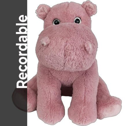 A pink stuffed hippo toy is sitting on a white background.
