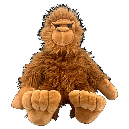 A plush toy of a large, furry brown animal resembling a bear or a similar creature.
