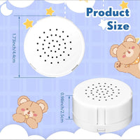 The image is a product size diagram for a white speaker with a circular design and a speaker with a circular design. The speaker has a diameter of 1.73 inches and a height of 0.96 inches. The image also includes a cartoon image of a bear and a bear with a yellow star on its head.