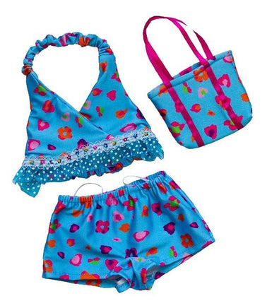 A set of three colorful swimwear items, including a halter top, shorts, and a purse, all featuring a floral print pattern in shades of blue and pink.