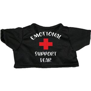 A black t-shirt with white text and a red cross symbol printed on it.