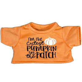 An orange t-shirt with the text "I'm The Cute Pumpkin in the Patch" printed on it.
