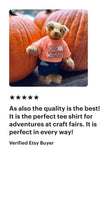 a picture of a teddy bear wearing a t - shirt