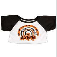 A Halloween-themed t-shirt with a black and white design featuring a rainbow, bats, and the word "Boo" written in a stylized font.
