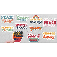 a collection of colorful stickers with various phrases and designs, including "Peace", "Groovy Vibes", "Living my best life", "Kindness is cool", "Good vibes only", "Take it easy", and "Choose happy".
