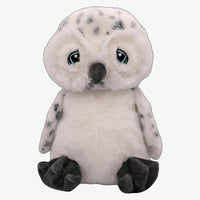 A plush toy of an owl with large eyes and a small beak.