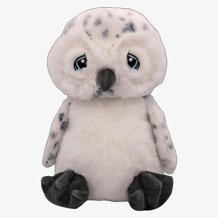 A plush toy of an owl with large eyes and a small beak.