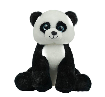 A stuffed panda bear toy with black and white fur and blue eyes is sitting on a white background.