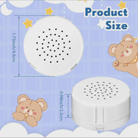 The image is a product size diagram for a white speaker with a circular design and a speaker with a circular design. The speaker has a diameter of 1.73 inches and a height of 0.96 inches. The image also includes a cartoon image of a bear and a bear with a yellow star on its head.