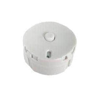 a white, circular object with a small button in the center.