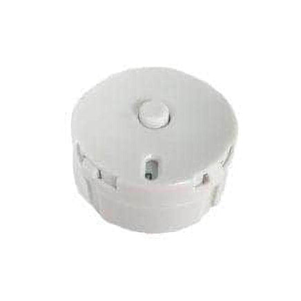 a white, circular object with a small button in the center.