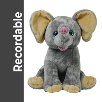 A gray stuffed elephant toy with large ears and a pink nose sits on a white background.