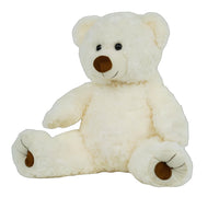 A white teddy bear sitting on its hind legs with its arms and legs spread out.
