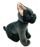A plush toy of a black dog with a pink ear.